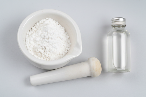 Potassium Sorbate in Bowl with Muddler and Phenoxyethanol Bottle