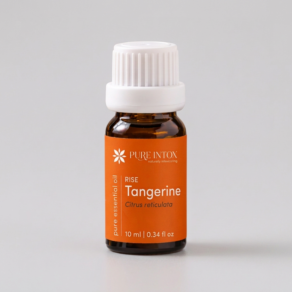 A 10 ml bottle of Pure Intox Rise Tangerine essential oil on a white background. The bottle is amber glass with a white ribbed cap and features an orange label with white text.